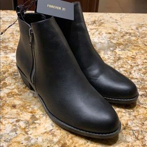Brand new, with tags, black booties